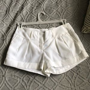 White Express pleated shorts size 6